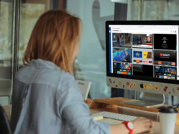 Witbe QoE monitoring on a desktop computer showing multiple video streams tested in real time.