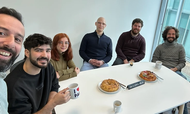 Witbe team in Lisbon sharing pastries and coffee at the office.
