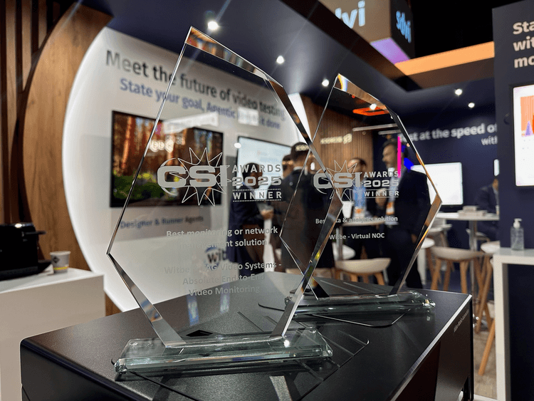 Close-up of Witbe’s CSI Awards 2025 trophies for Best Monitoring Solution and Best Data & Analytics Solution, displayed at the company’s booth.